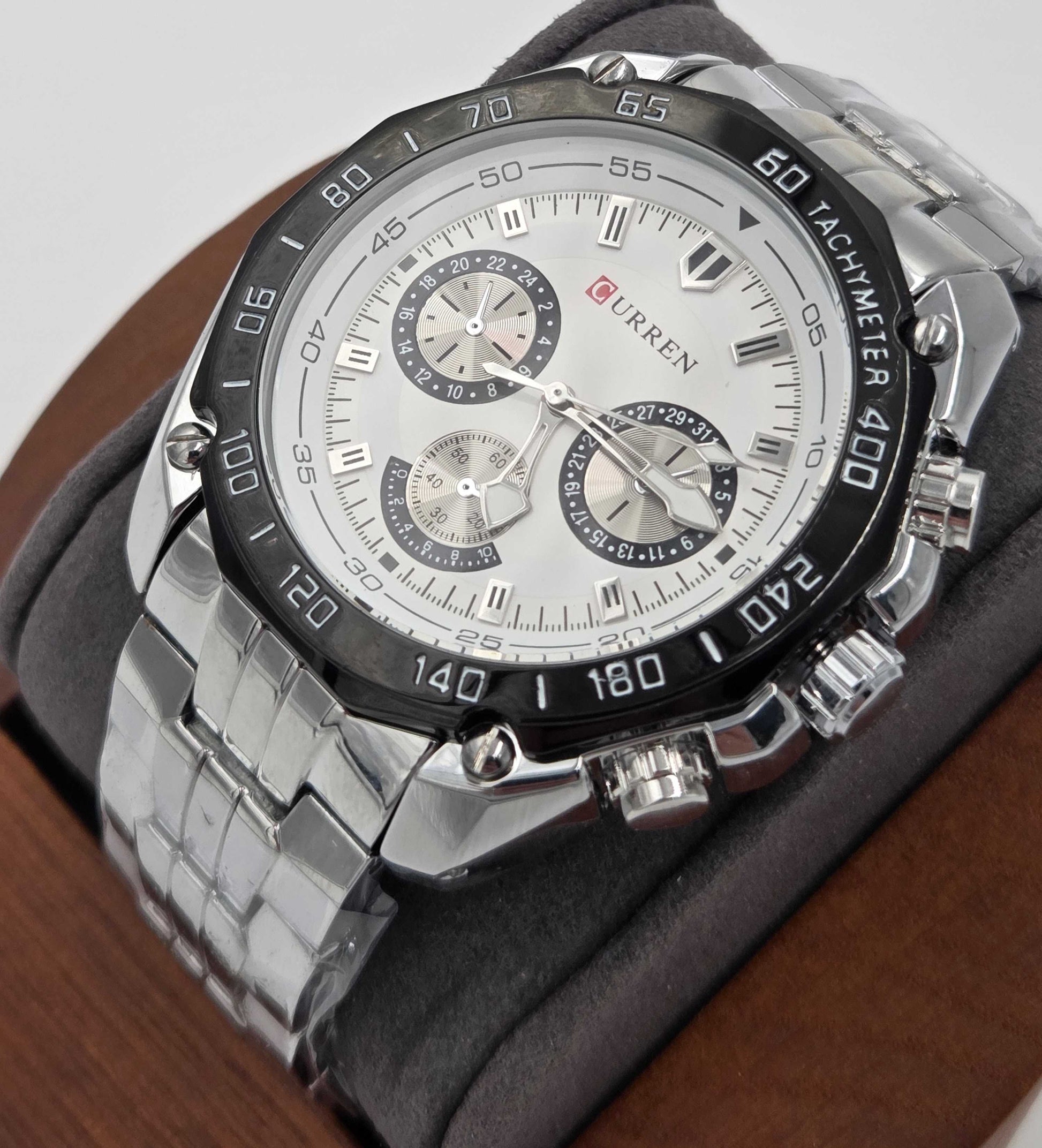 Curren 8077 men’s quartz watch with stainless steel band, black bezel, and industrial dial design